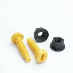 Yellow bolts and black nuts for securing motorbike number plates.