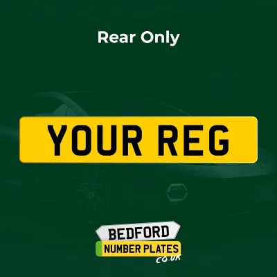 Yellow rear number plate with bold black text.