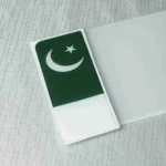 Pakistan flag number plate badge with crescent and star.