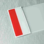 Poland flag number plate badge with red and white design.