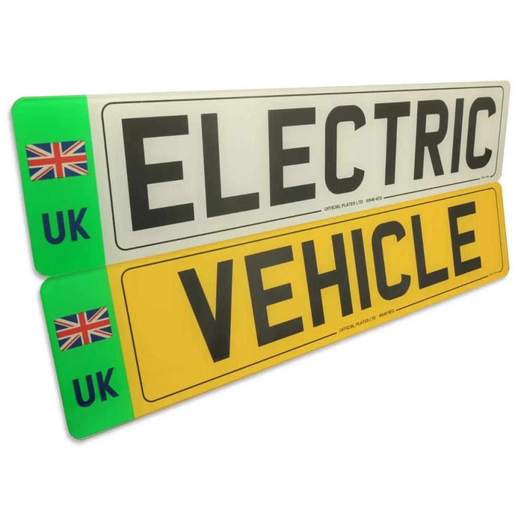 Pair of UK electric vehicle number plates featuring printed black lettering, reflective white and yellow backgrounds, and green EV badges with Union Jack flags and UK identifiers.