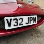 4D Retro short number plate on Jaguar