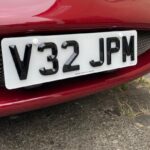 4D Retro short number plate on Jaguar