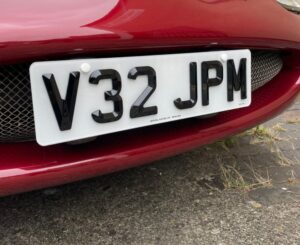 4D Retro short number plate on Jaguar
