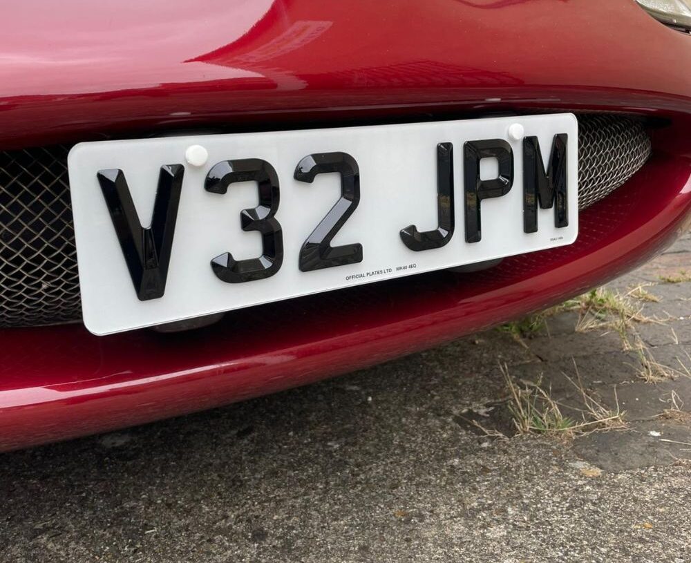 4D Retro short number plate on Jaguar